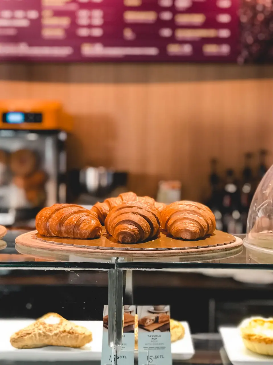 Freshly baked artisan pastries and croissants in an elegant display